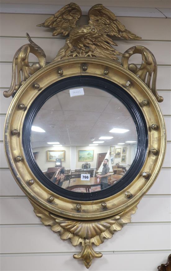 A William IV carved giltwood convex mirror, H.98cm